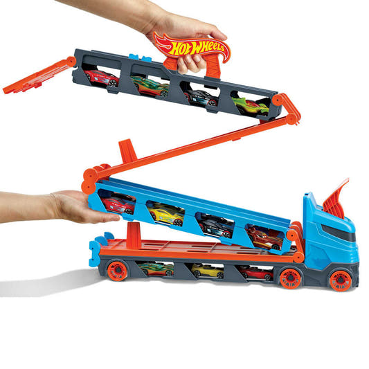 Camión transportador Hot Wheels azul y naranja con tres coches - 4