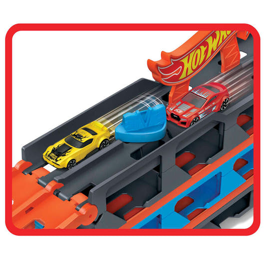 Camión transportador Hot Wheels azul y naranja con tres coches - 5