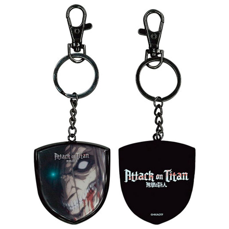 Llavero metálico Attack on Titan con rostro de titán y logotipo