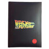 Diario negro de Regreso al Futuro con logo luminoso