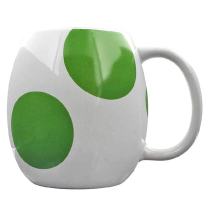 Taza blanca con manchas verdes inspirada en el Huevo de Yoshi