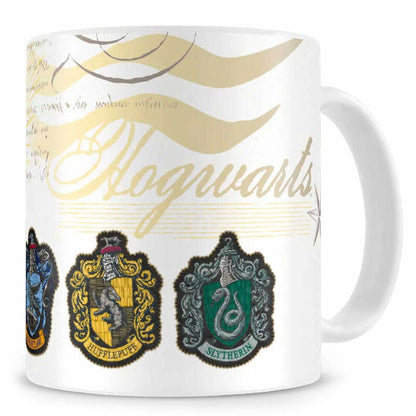 Taza blanca de Harry Potter con escudos de las casas de Hogwarts