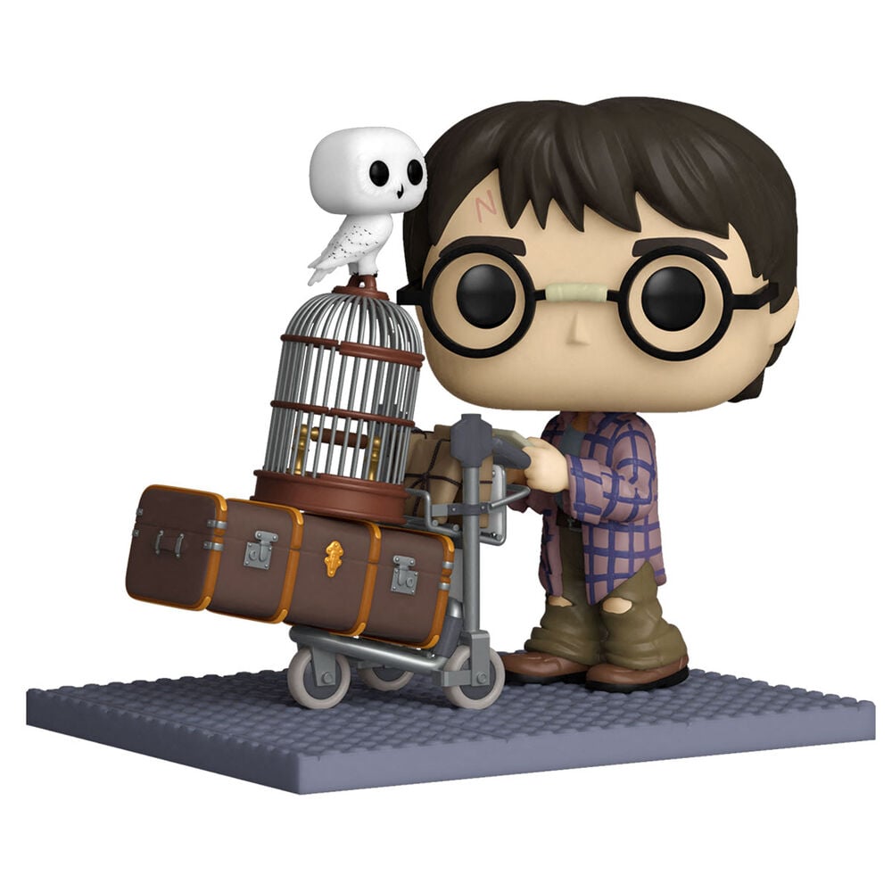 Figura Funko POP! de Harry Potter empujando un carrito con maletas y un búho blanco