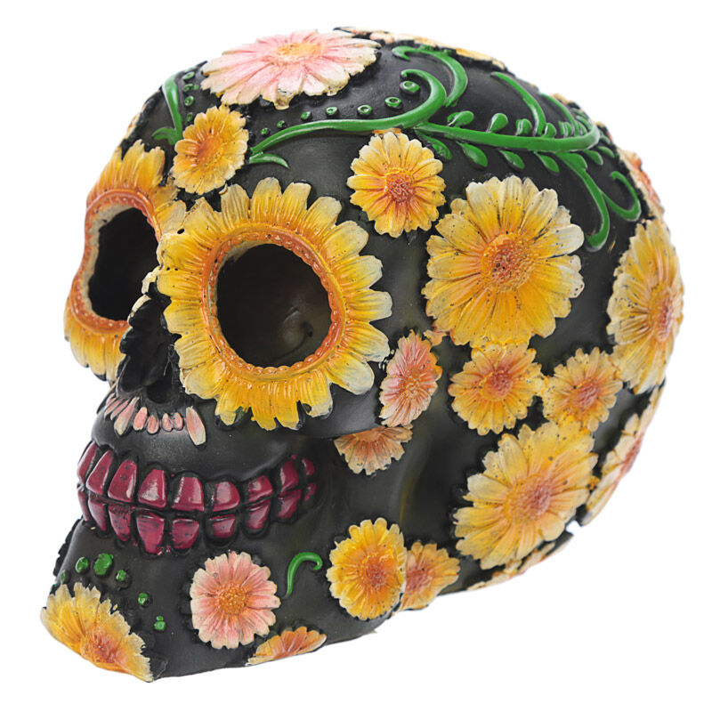 Figura calavera del Día de los Muertos con margaritas de colores