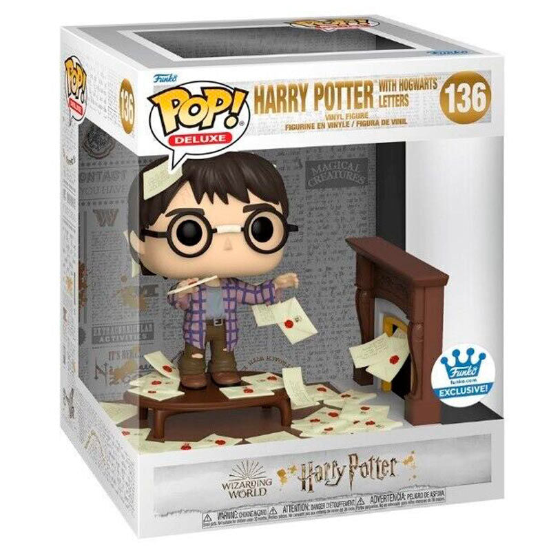 Figura Funko POP! Deluxe de Harry Potter con cartas de Hogwarts en caja con ventana