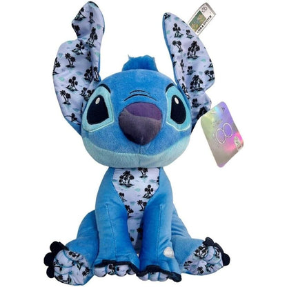 Peluche de Stitch Disney azul con estampado tropical