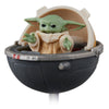 Figura articulada de Grogu en una cápsula de Star Wars