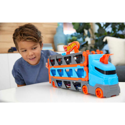 Camión transportador Hot Wheels azul y naranja con tres coches - 3
