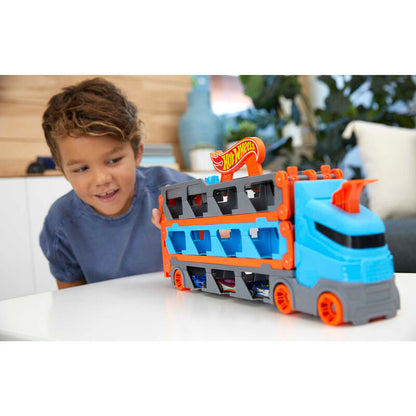 Camión transportador Hot Wheels azul y naranja con tres coches - 3