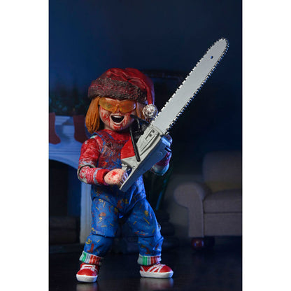 Figura articulada NECA Ultimate Holiday Chucky con motosierra