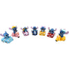 Figuras surtidas de Stitch Disney montado en vehículos coloridos