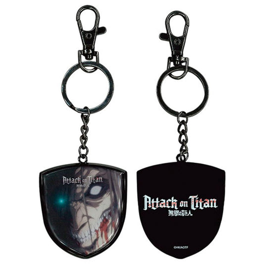 Llavero metálico Attack on Titan con rostro de titán y logotipo