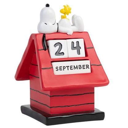 Calendario perpetuo 3D de Snoopy sobre su caseta roja