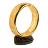 Lámpara One Ring dorada de El Señor de los Anillos sobre base oscura