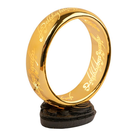 Lámpara One Ring dorada de El Señor de los Anillos sobre base oscura