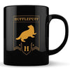 Taza negra de Harry Potter con diseño dorado de Hufflepuff