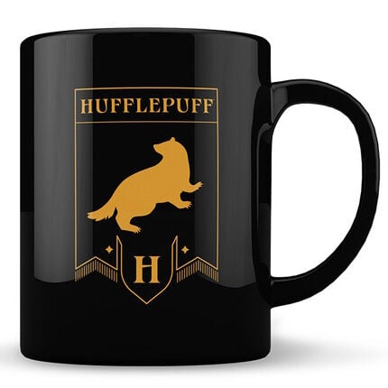 Taza negra de Harry Potter con diseño dorado de Hufflepuff