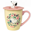 Taza amarilla con tapa rosa y figura de Snoopy