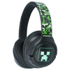 Auriculares inalámbricos Minecraft negros con detalles pixelados verdes y LED