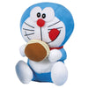 Peluche de Doraemon sentado con un dorayaki, 40 cm