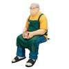 Figura Noodle Stopper de Taro Sakamoto sentado con gafas y delantal verde