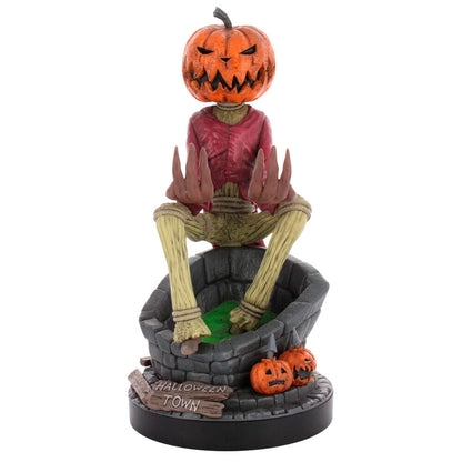 Soporte Cable Guy de Pumpkin King sobre un pozo de Halloween Town