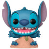 Figura Funko POP! de Stitch sentado sobre la arena