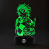 Lámpara LED de Demon Slayer con Tanjiro iluminado en verde