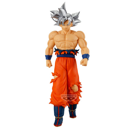 Figura de Son Goku de Dragon Ball Super con cabello plateado y pantalón naranja