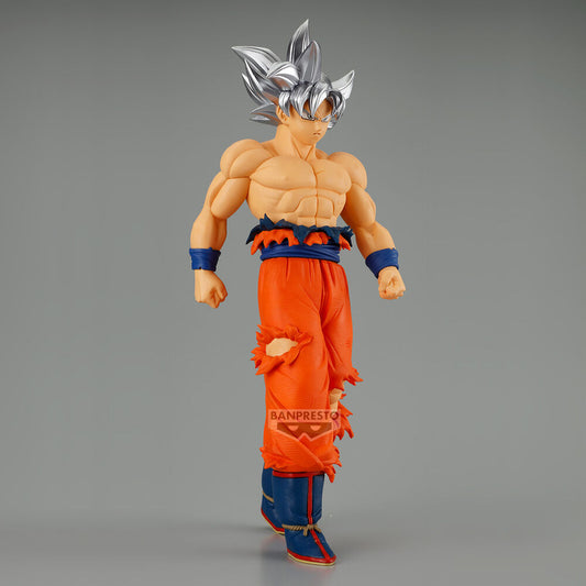 Figura de Son Goku de Dragon Ball Super con cabello plateado y pantalón naranja - 4