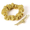 Set dorado de pinza Snitch y mini coletero Harry Potter