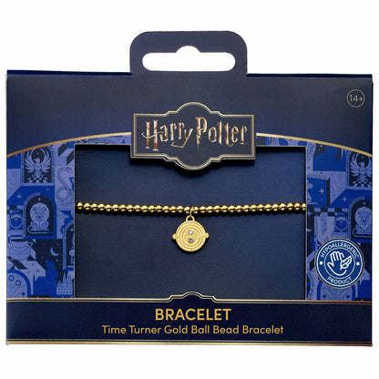 Pulsera dorada del Giratiempo de Harry Potter en su presentación