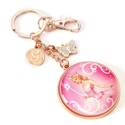 Llavero de Glinda de Wicked con medallón rosa y mariposa