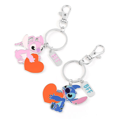 Set de dos llaveros Disney de Stitch y Angel con corazones naranjas - 2