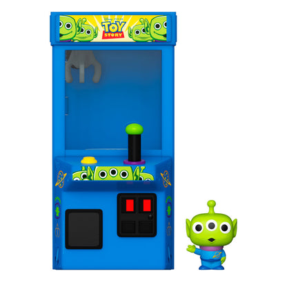 Figura FUNKO Bitty POP! Alien de Toy Story junto a estuche arcade azul