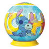 Puzzle 3D esférico de Stitch Disney Ravensburger sobre base amarilla