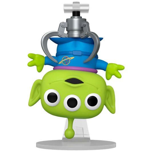 Figura Funko POP! del Alien de Toy Story bajo una garra mecánica