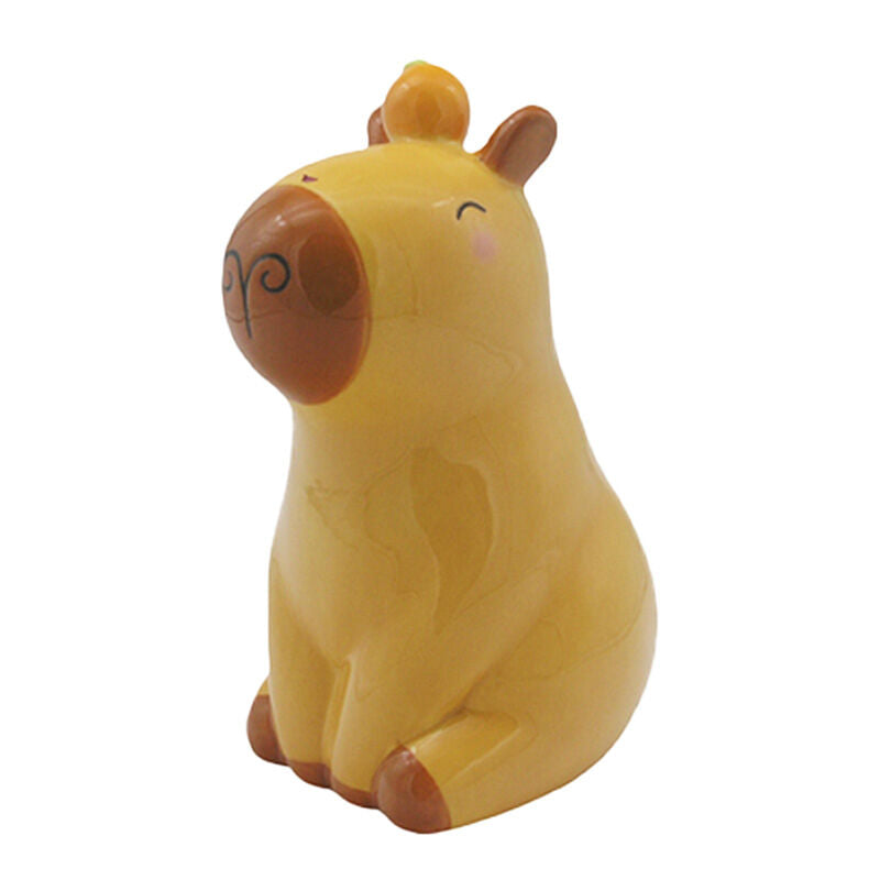 Hucha de cerámica con diseño de capibara en amarillo y marrón
