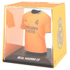 Figura mini de camiseta naranja del Real Madrid en estuche