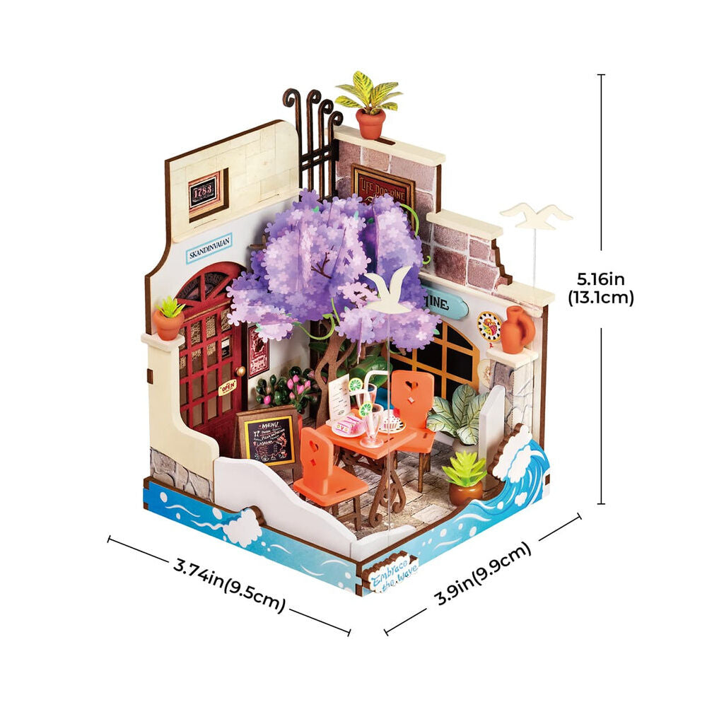 Maqueta Sea Holiday Restaurant de ROBOTIME Rolife con terraza costera y jacaranda en flor - 4