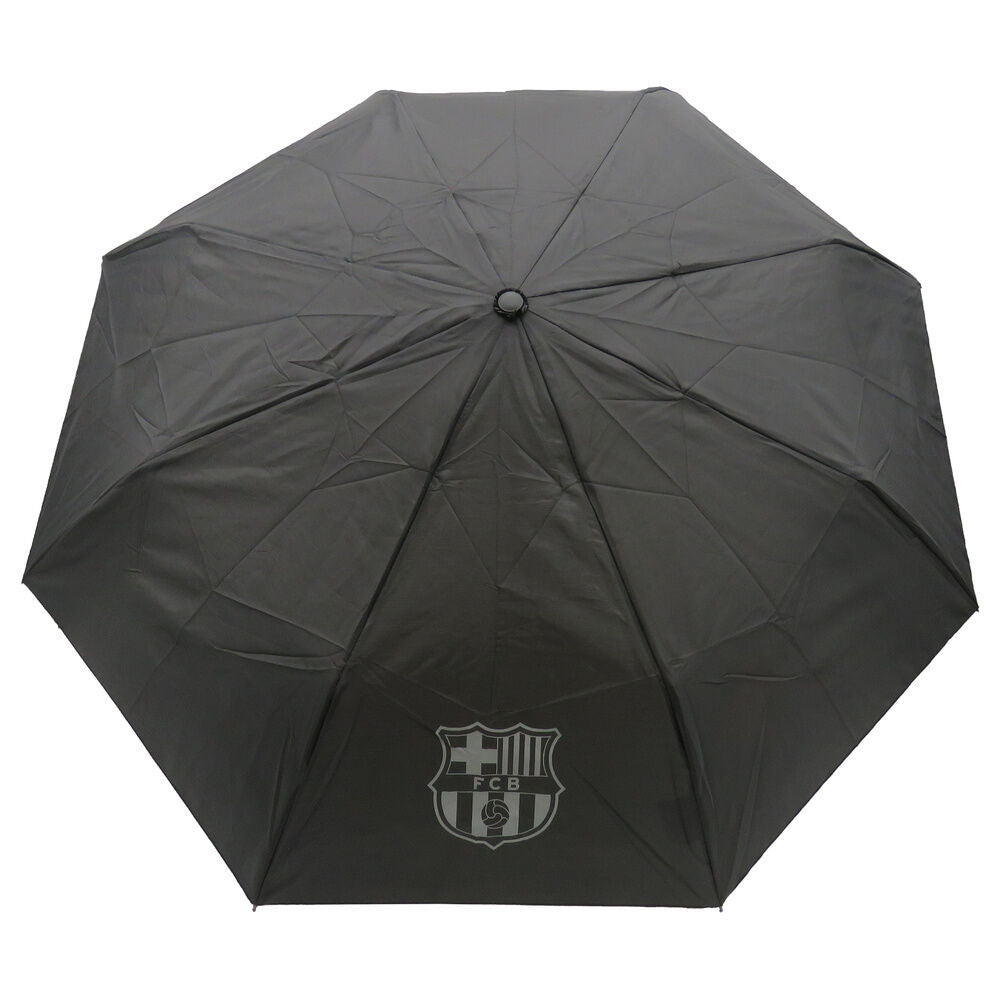 Paraguas plegable negro del FC Barcelona con escudo visible