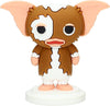 Figura Pokis de Gizmo de Gremlins sobre base circular