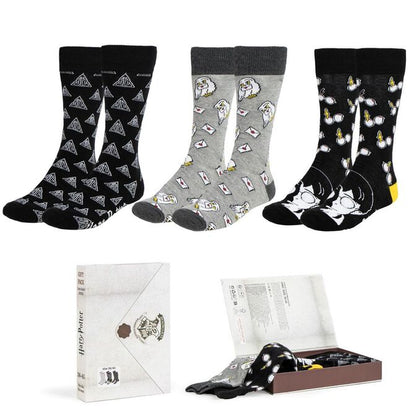Set de tres calcetines Harry Potter CERDÁ con diseños negros y grises