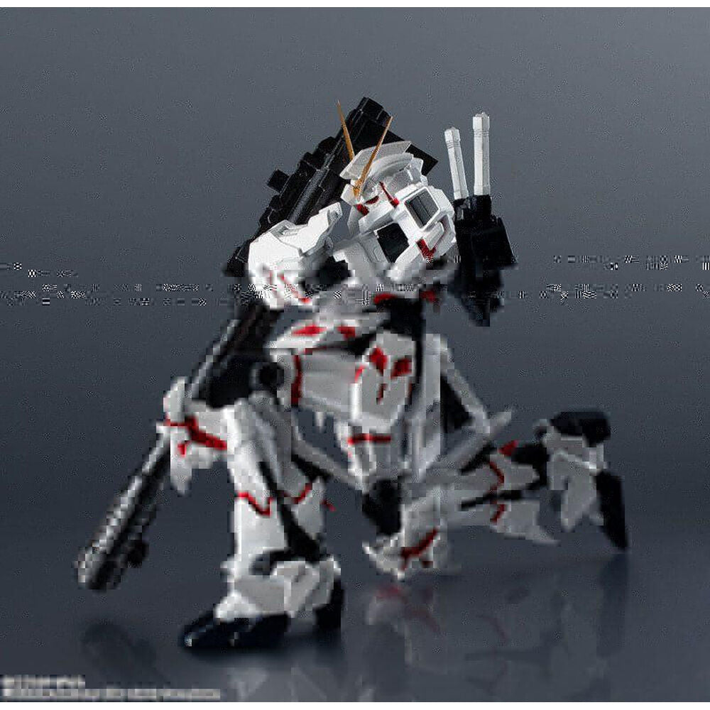 Figura RX-0 Unicorn Gundam blanca con detalles rojos y efecto de energía rosa - 5