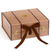 Caja regalo maleta Harry Potter M con emblema de Hogwarts y lazo marrón