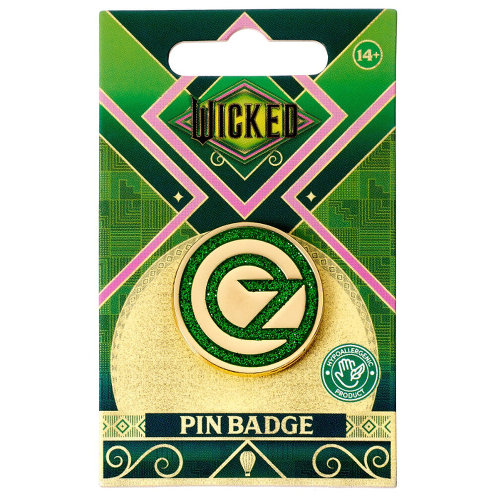 Pin circular verde y dorado con logo de Oz de Wicked