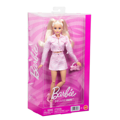 Muñeca Barbie Deluxe con chaqueta y falda vaquera rosas