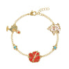Pulsera de charms dorada de Vaiana Moana Disney con flor roja y detalles azules