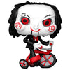 Figura Funko POP! de Billy de Saw sobre un triciclo