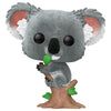 Figura Funko POP! de koala gris sobre un tronco